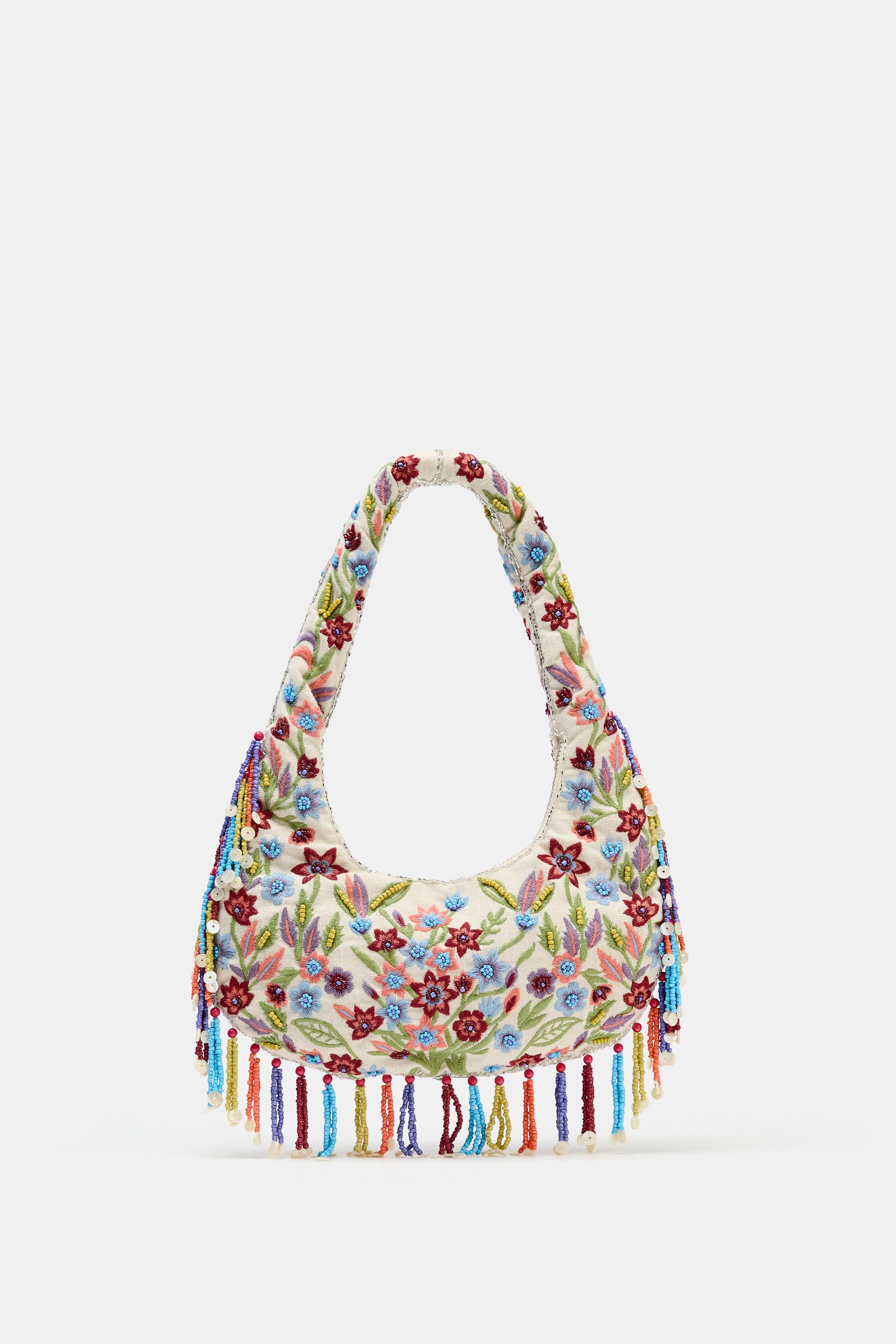 OVAL BAG WITH FLORAL EMBROIDERY